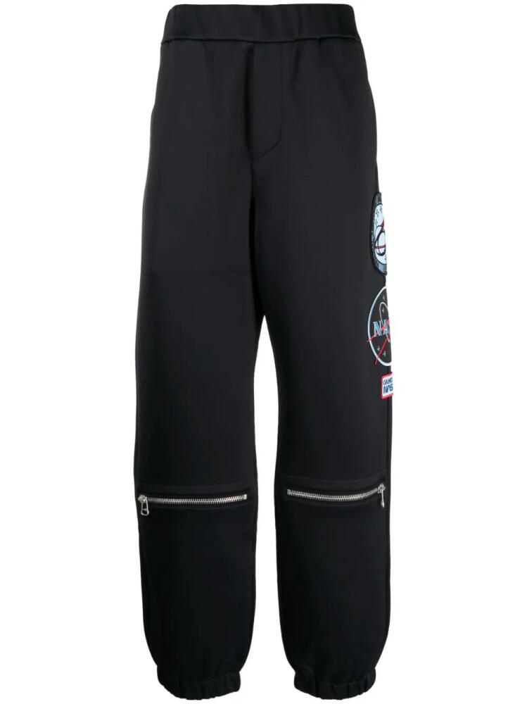 OAMC x Nasa multi-patch track pants - Black Cover