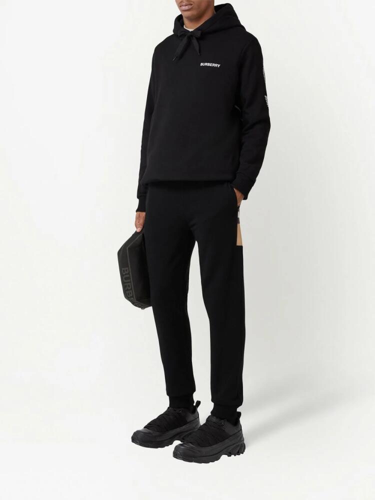 Burberry check-panelled track pants - Black Cover