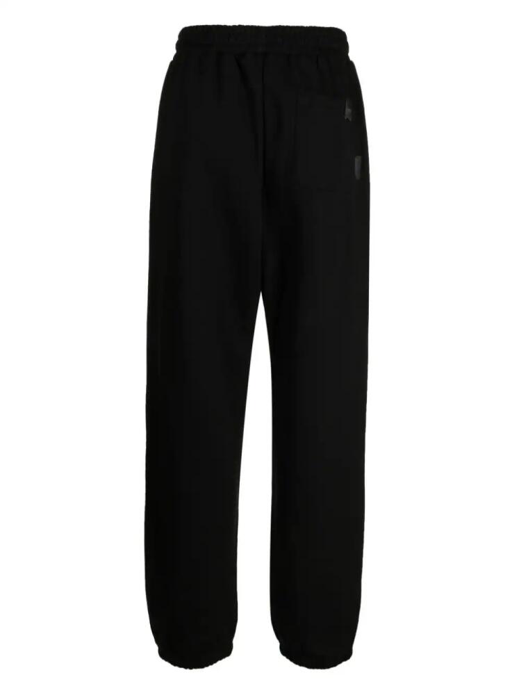 izzue logo-embroidered slip-on track pants - Black Cover