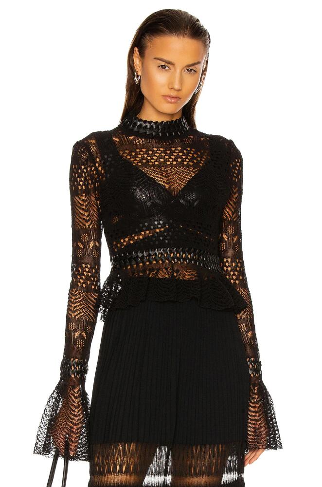 ALAÏA Fitted Long Sleeve Top in Black Cover