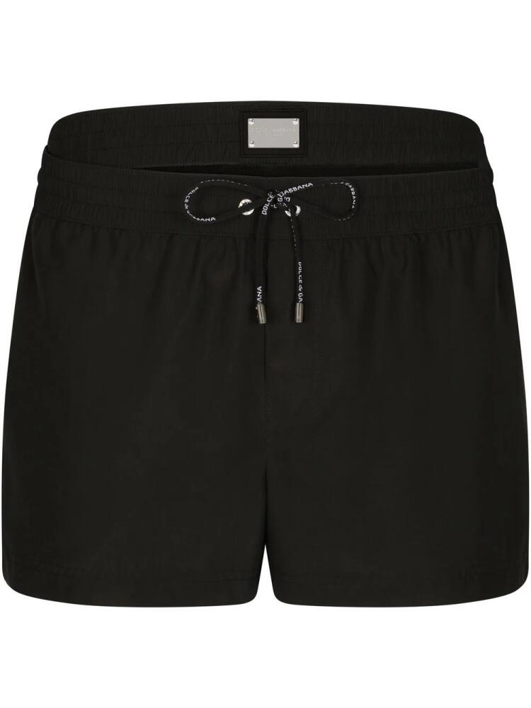 Dolce & Gabbana double-waistband logo-tag swim shorts - Black Cover