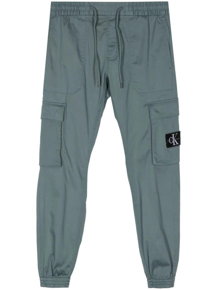 Calvin Klein logo-patch track pants - Blue Cover