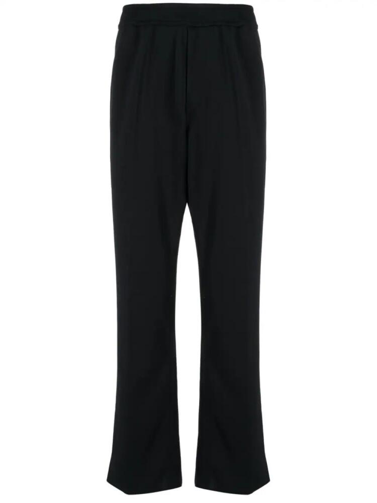 CFCL pressed-crease elasticated-waist trousers - Black Cover