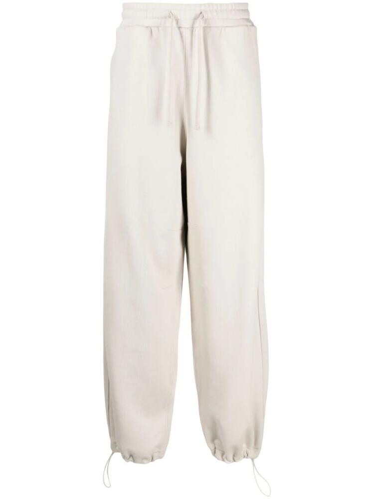 FIVE CM logo-appliqué cotton track pants - White Cover