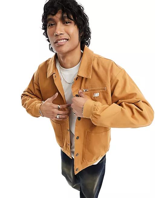 New Balance coach jacket in tobacco brown Cover