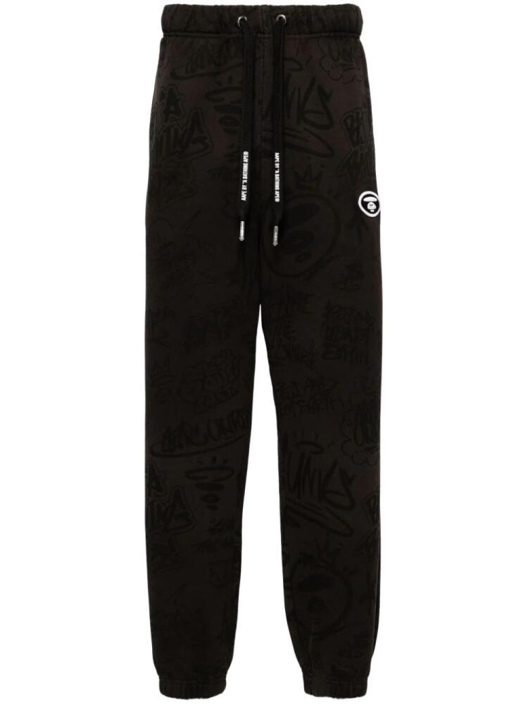 AAPE BY *A BATHING APE® graphic-print drawstring track pants - Black Cover