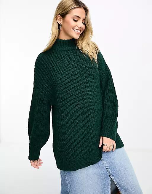 Monki high neck chunky rib knitted sweater with volume sleeve in dark green Cover