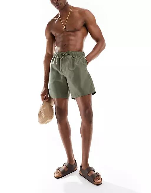 ASOS DESIGN swim shorts in mid length in khaki-Green Cover