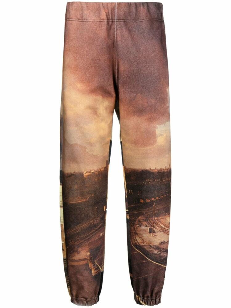 Undercover all-over city print track pants - Brown Cover