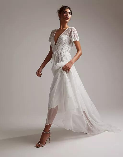 ASOS DESIGN Frankie beaded mesh plunge cap sleeve wedding dress in ivory-White Cover