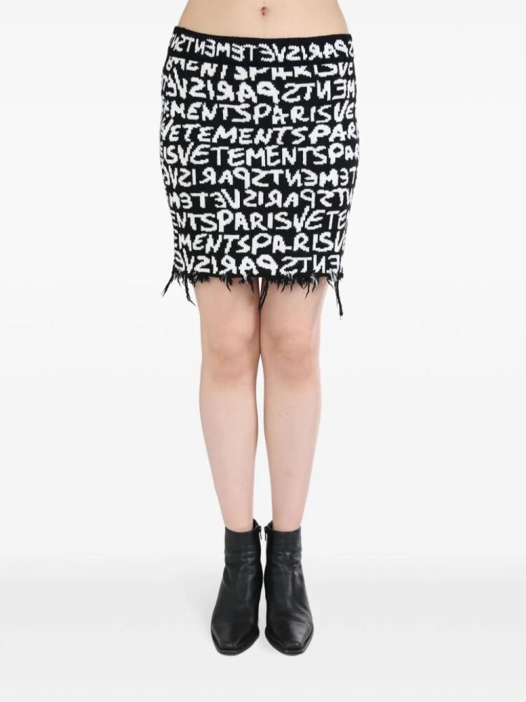 VETEMENTS Graffiti monogram skirt - Black Cover