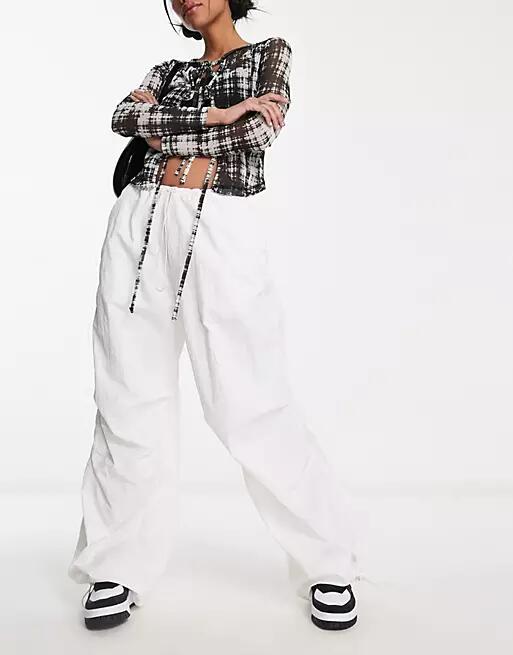 ASOS DESIGN parachute cargo pants in white Cover