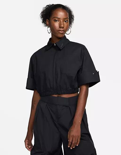 Nike MDC woven cropped collared shirt in black Cover