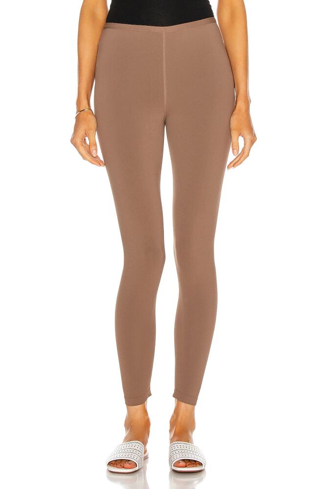 ALAÏA Stretch Legging in Brown Cover