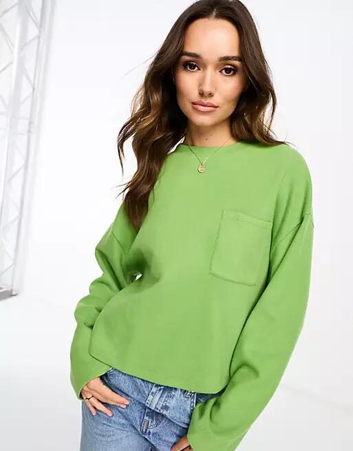 ASOS DESIGN super soft oversized sweater with pocket detail in green Cover