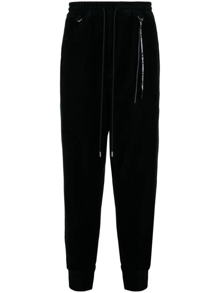 Mastermind World logo-jacquard tapered track pants - Black Cover