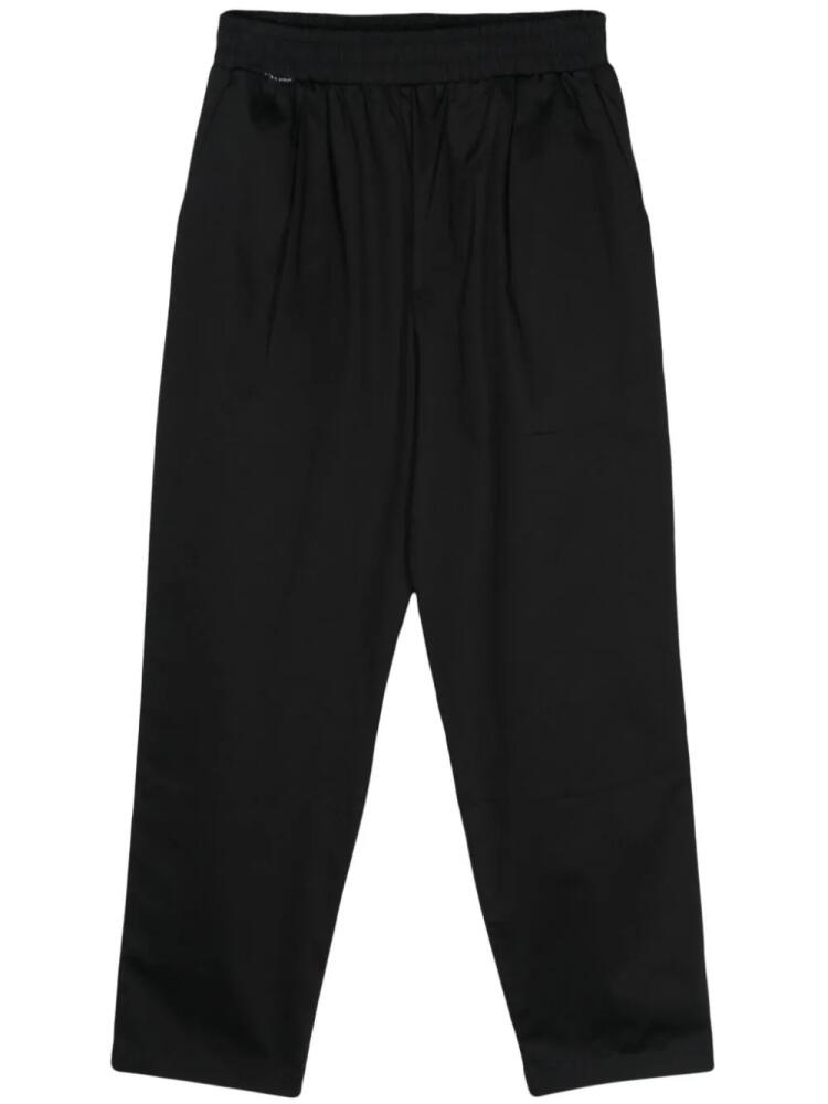 Family First twill tapered-leg trousers - Black Cover