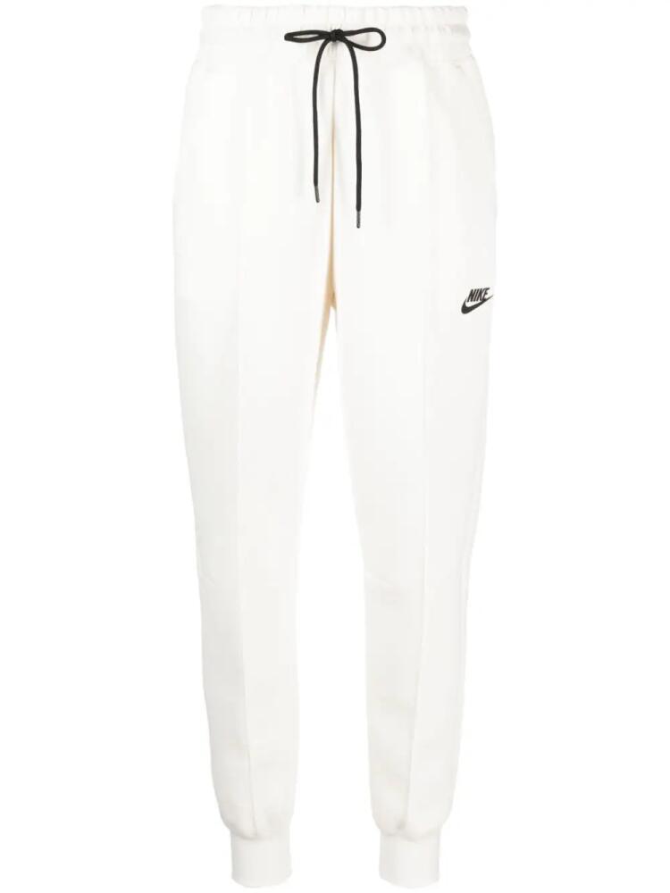 Nike logo-print fleece track pants - Neutrals Cover