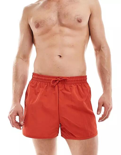 Weekday Tan runner swim shorts in red Cover