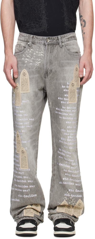 Who Decides War Gray Scripture Jeans Cover