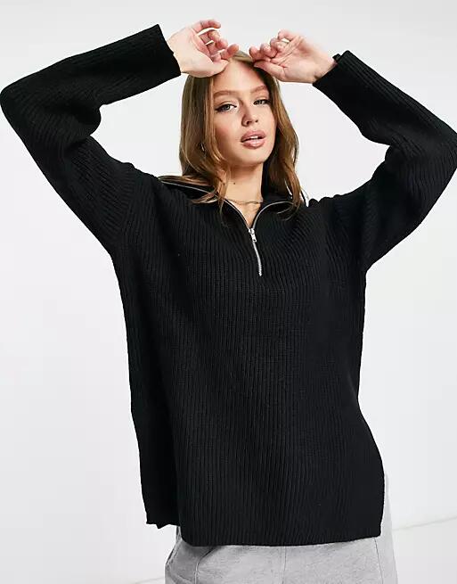 Monki knit zip front sweater in black Cover