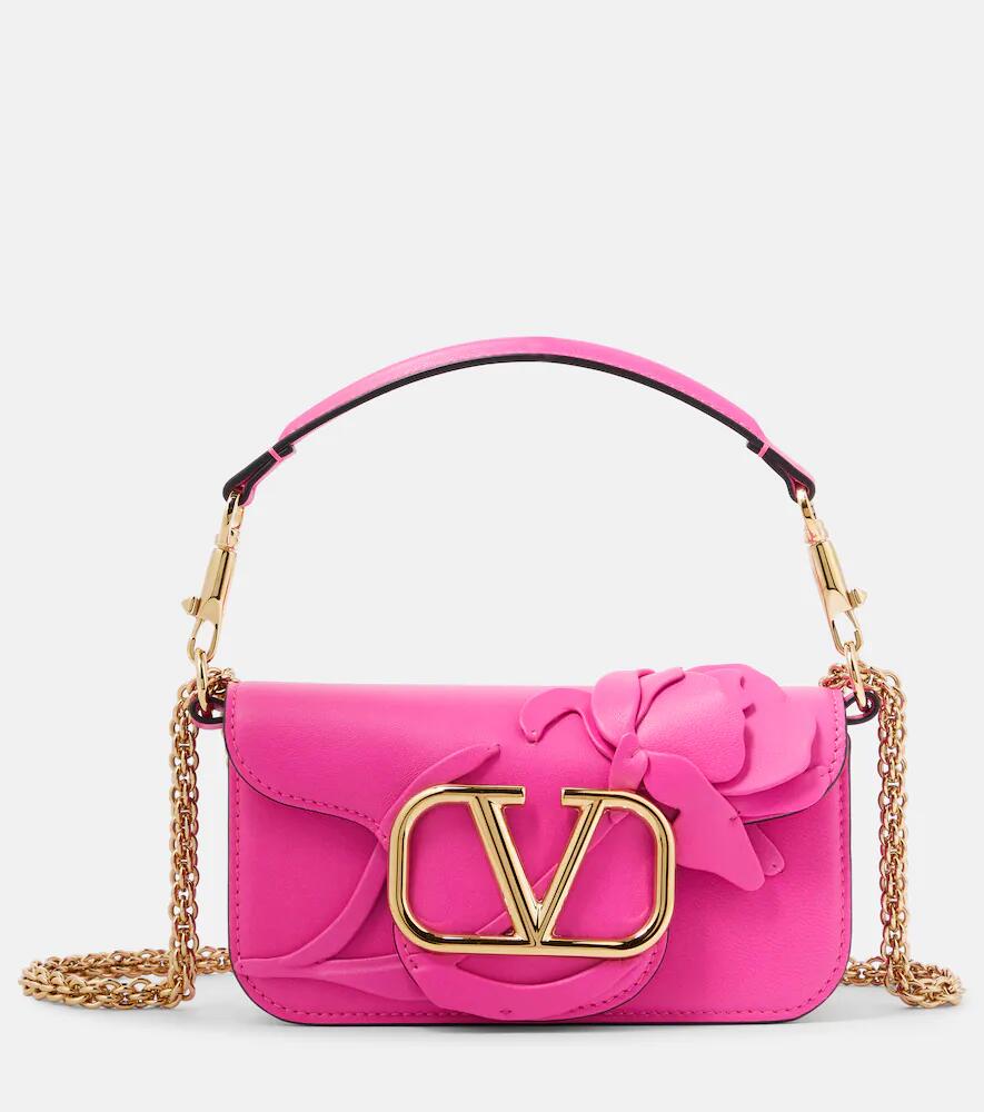 Valentino Garavani Locò Small appliqué leather shoulder bag Cover