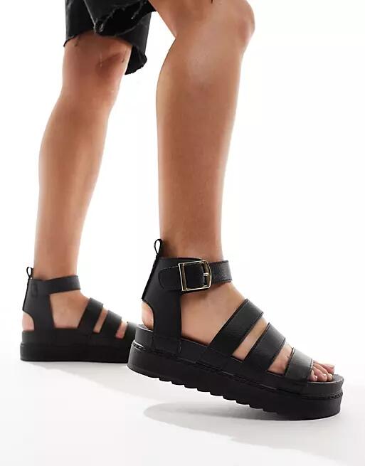 Truffle Collection wide strap sandals in black Cover