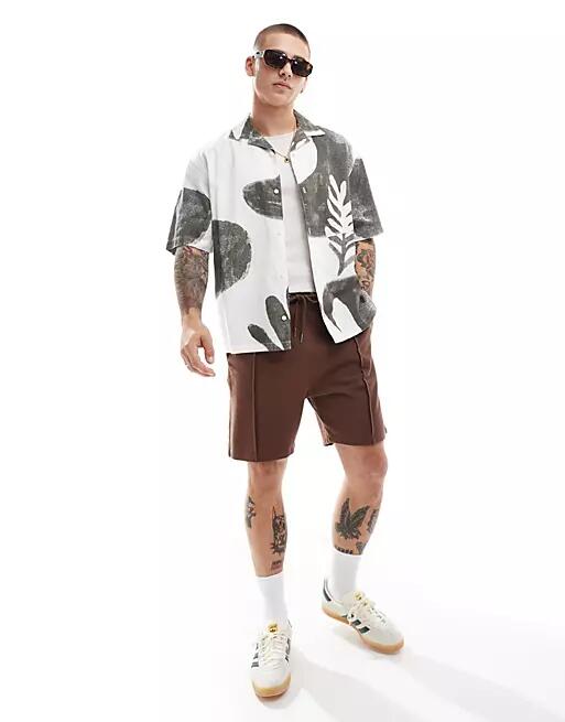 Pull & bear abstract palm print shirt in white and khaki Cover