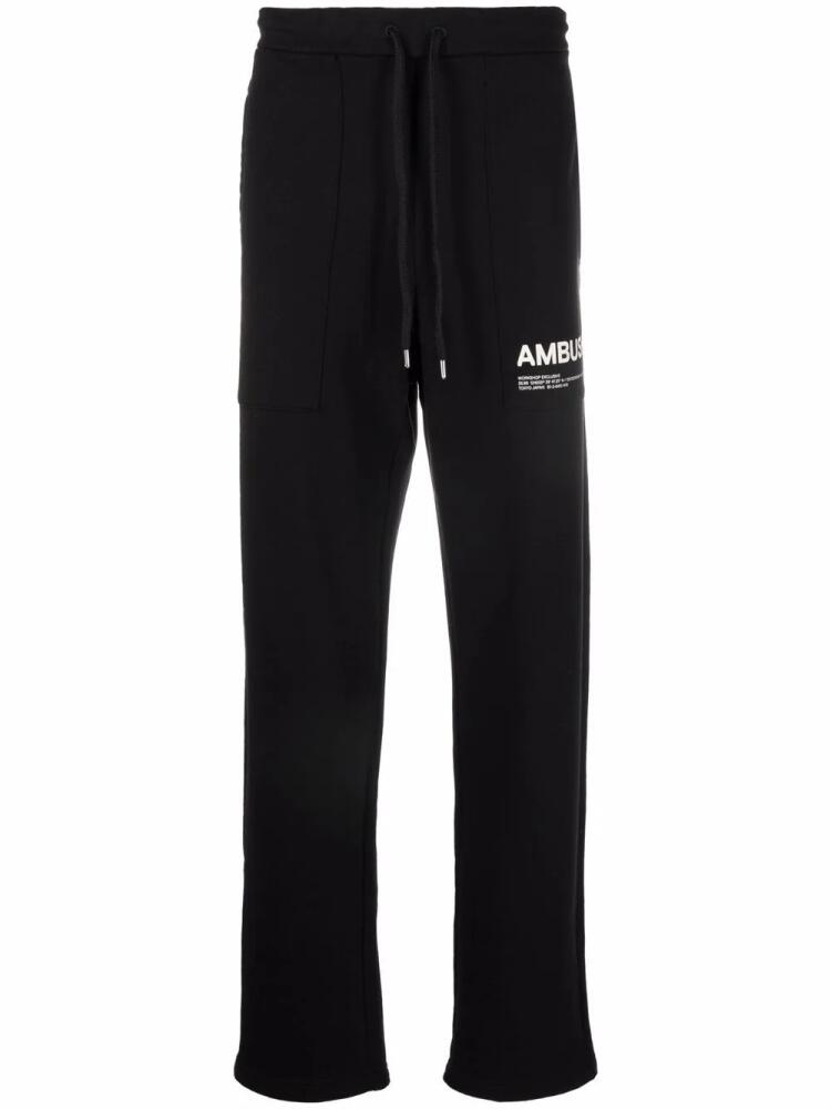 AMBUSH logo-print track pants - Black Cover