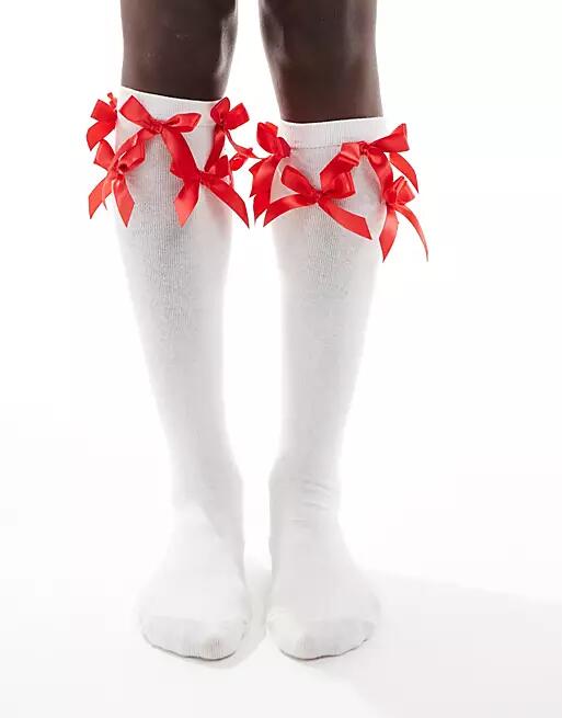 Reclaimed Vintage knee-high socks with red bows in white Cover