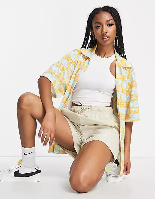 Nike Spring Break printed revere collar shirt in yellow Cover