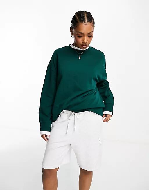 Monki long sleeve oversized sweater in dark green Cover