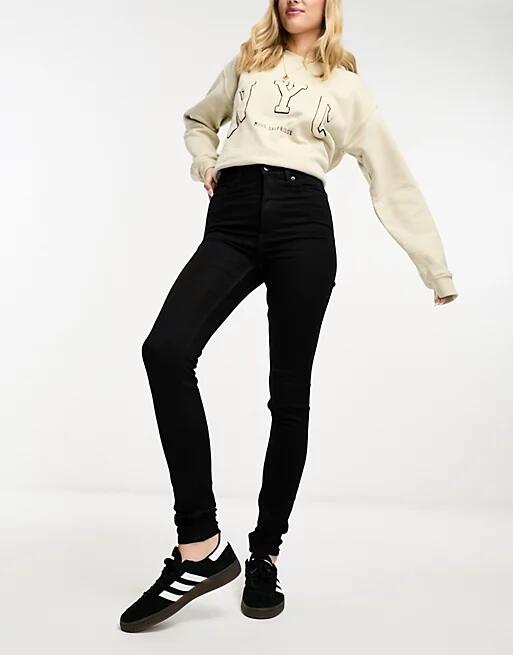 Monki Oki high rise skinny jeans in black Cover