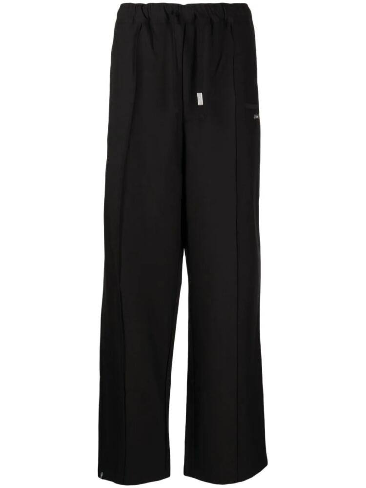 izzue logo-plaque straight-leg trousers - Black Cover