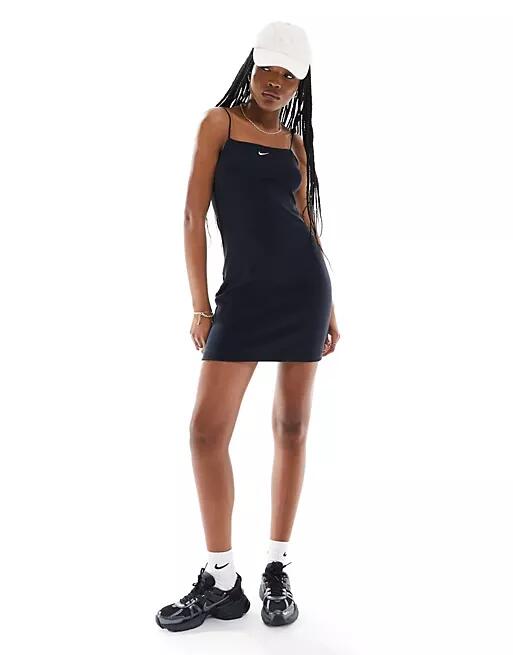 Nike ribbed mini dress in black Cover