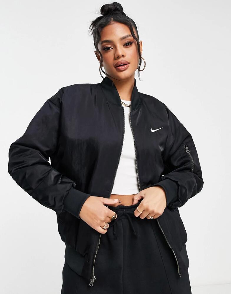 Nike reversible varsity bomber jacket in black Cover