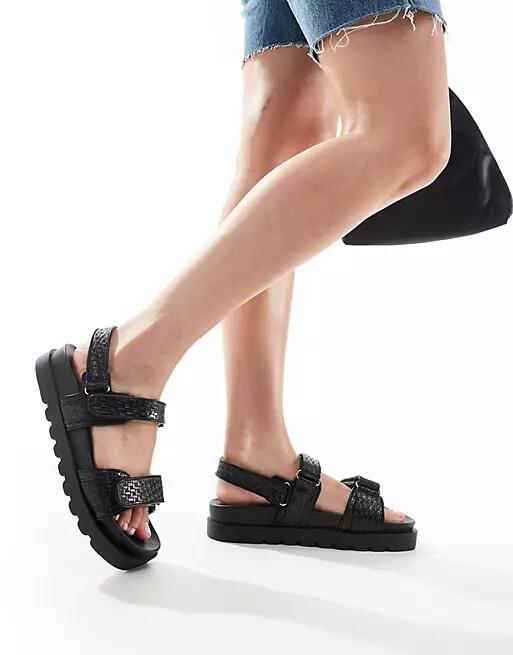 Truffle Collection braided strap footbed sandals in black Cover