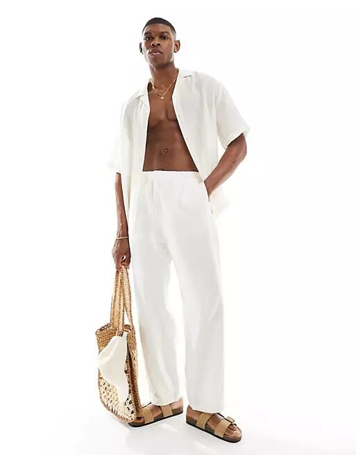 Weekday Seth linen pants in off-white Cover