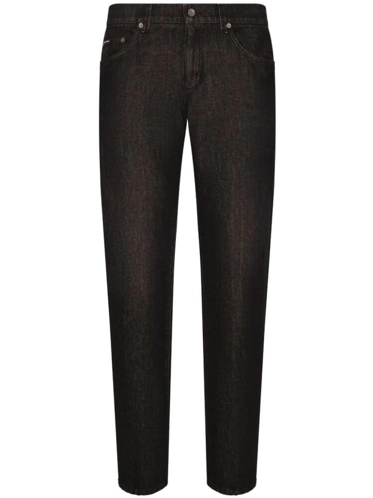 Dolce & Gabbana logo-appliqué long-length tapered jeans - Black Cover