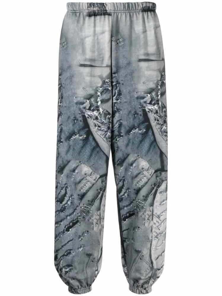 Natasha Zinko denim-print track pants - Blue Cover