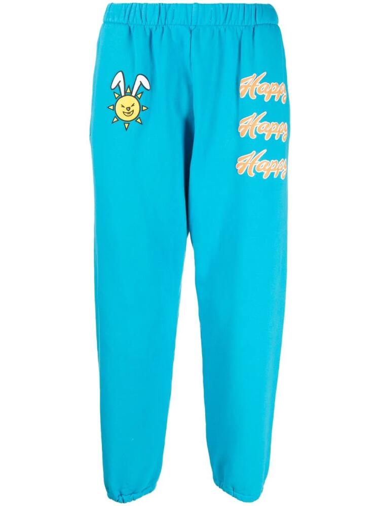 Natasha Zinko Happy-print detail track pants - Blue Cover