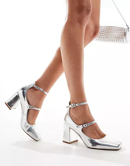 Simmi London Wide Fit Vinda mid block heel shoes with straps in silver metallic Cover