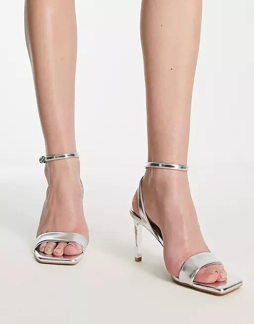 Stradivarius sling back heeled sandals in silver Cover