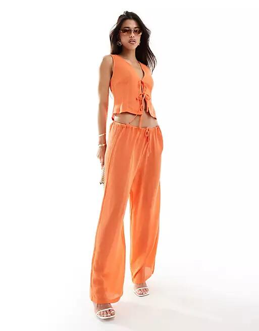 Kaiia tie waist wide leg pants in orange - part of a set Cover