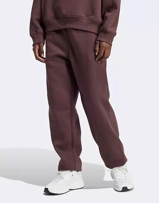 adidas Originals essential track pants in brown Cover