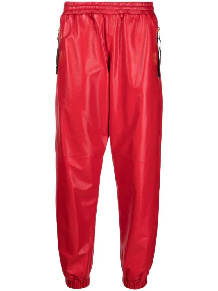 Moschino logo-plaque leather track pants - Red Cover