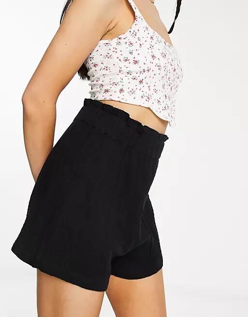 Monki high rise pull on shorts in black Cover