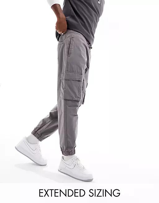 ASOS DESIGN tapered pull on cargo pants in washed charcoal with elastic waist-Gray Cover