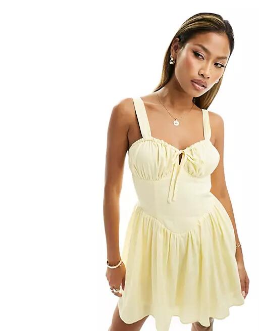 Kaiia milkmaid tie front mini dress in yellow Cover