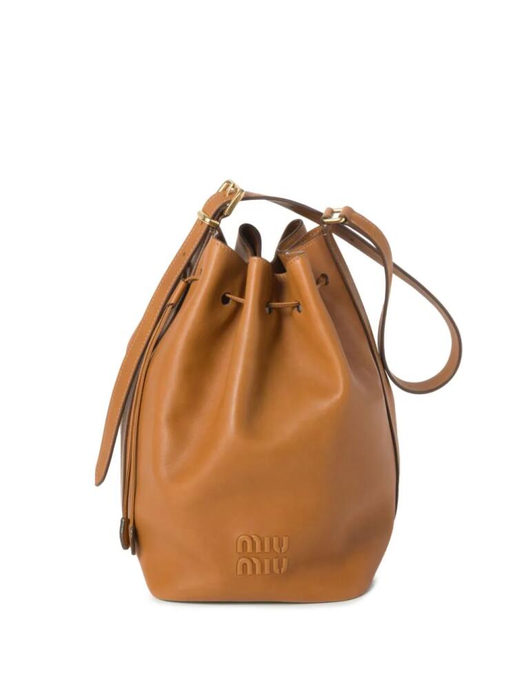 Miu Miu logo-embossed leather bucket bag - Brown Cover